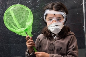 Young girl learning science